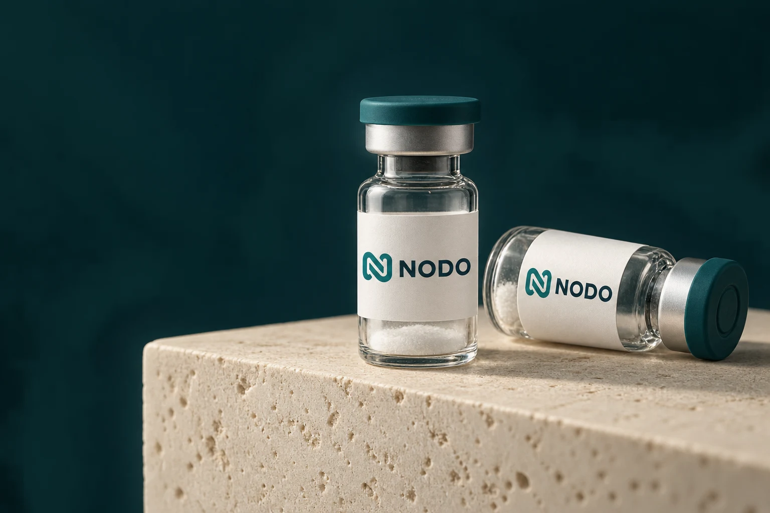 Illustrative NODO vial packaging with the teal connection mark